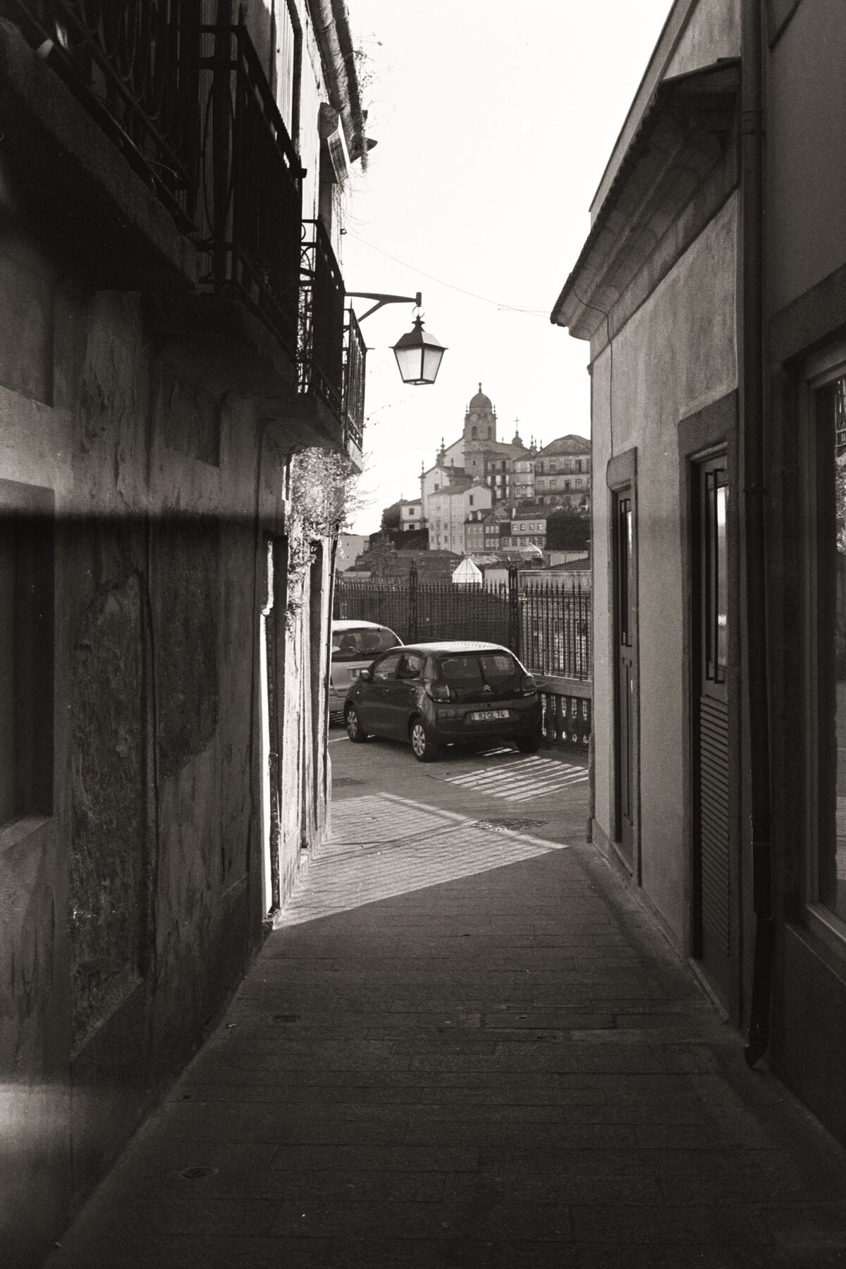 Narrow Porto street, parked cars