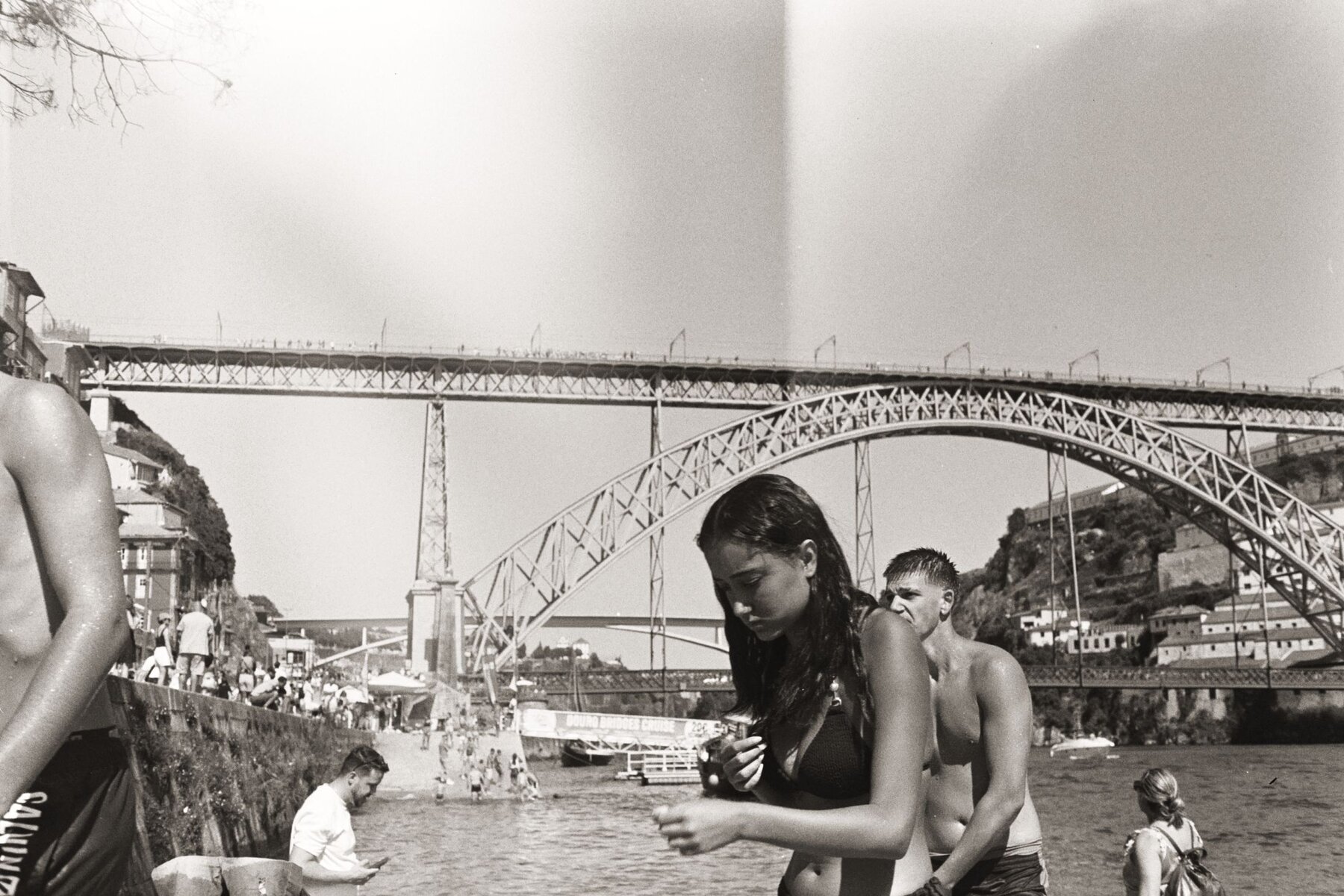 Swimmers below the Dom Luís bridge, Porto